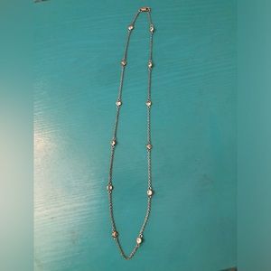 Sterling Silver and CZ station necklace.